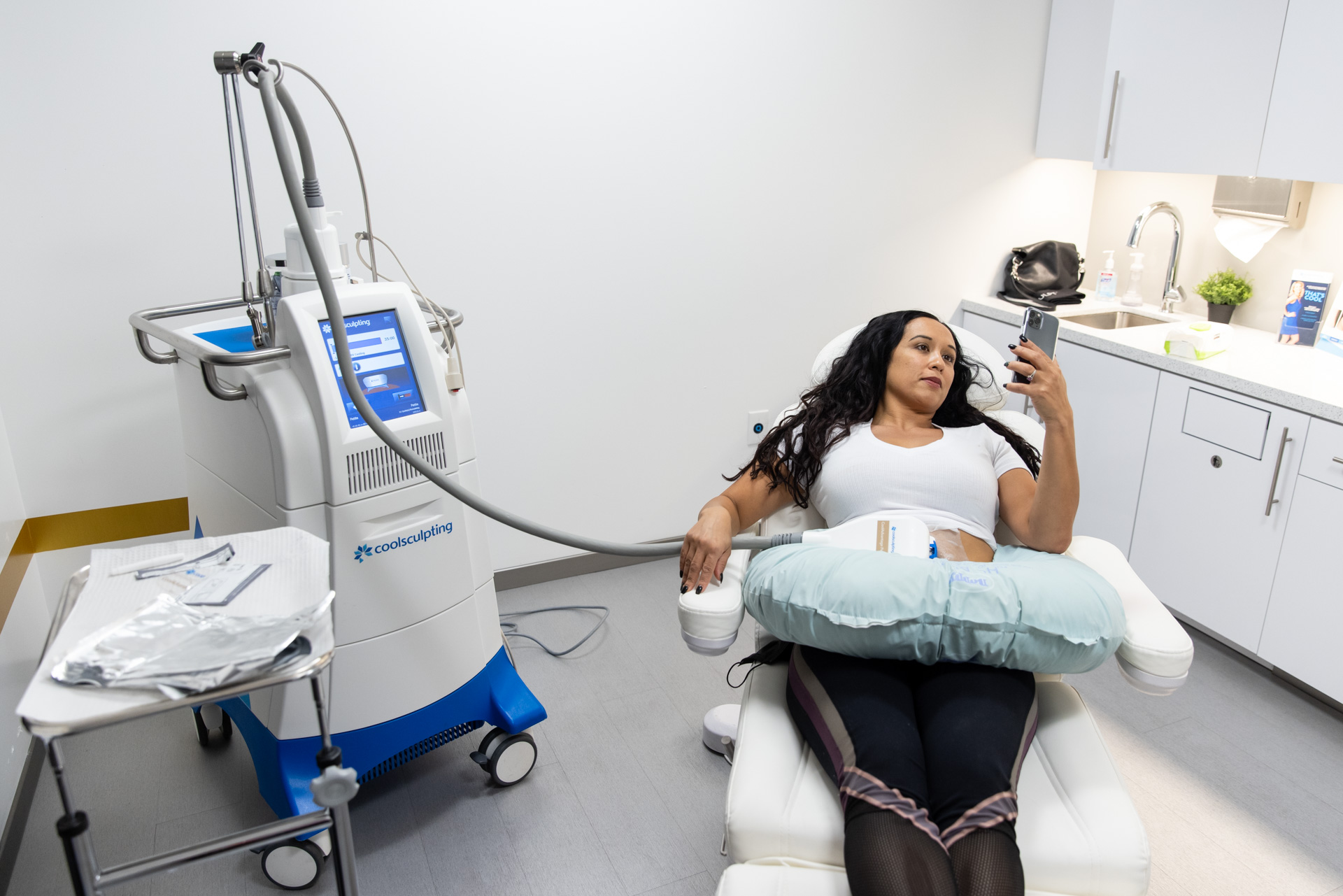 woman relaxing during a coolsculpting treatment in Menlo Park